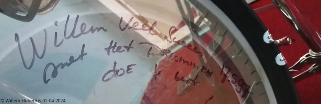 Part of the signature on the bass drum.