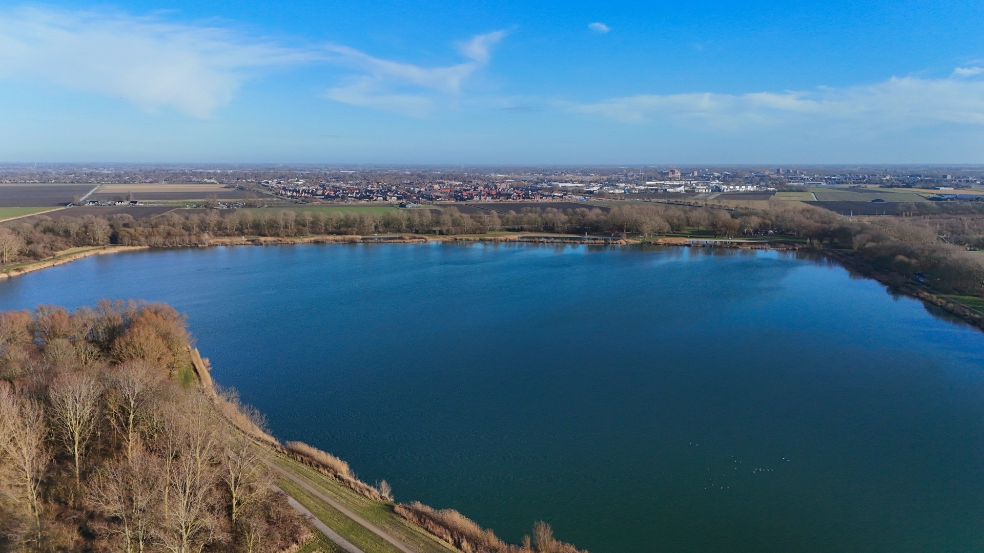 View of the lake "Zomerdel" in Noord-Scharwoude. Its a beautiful sunny day.