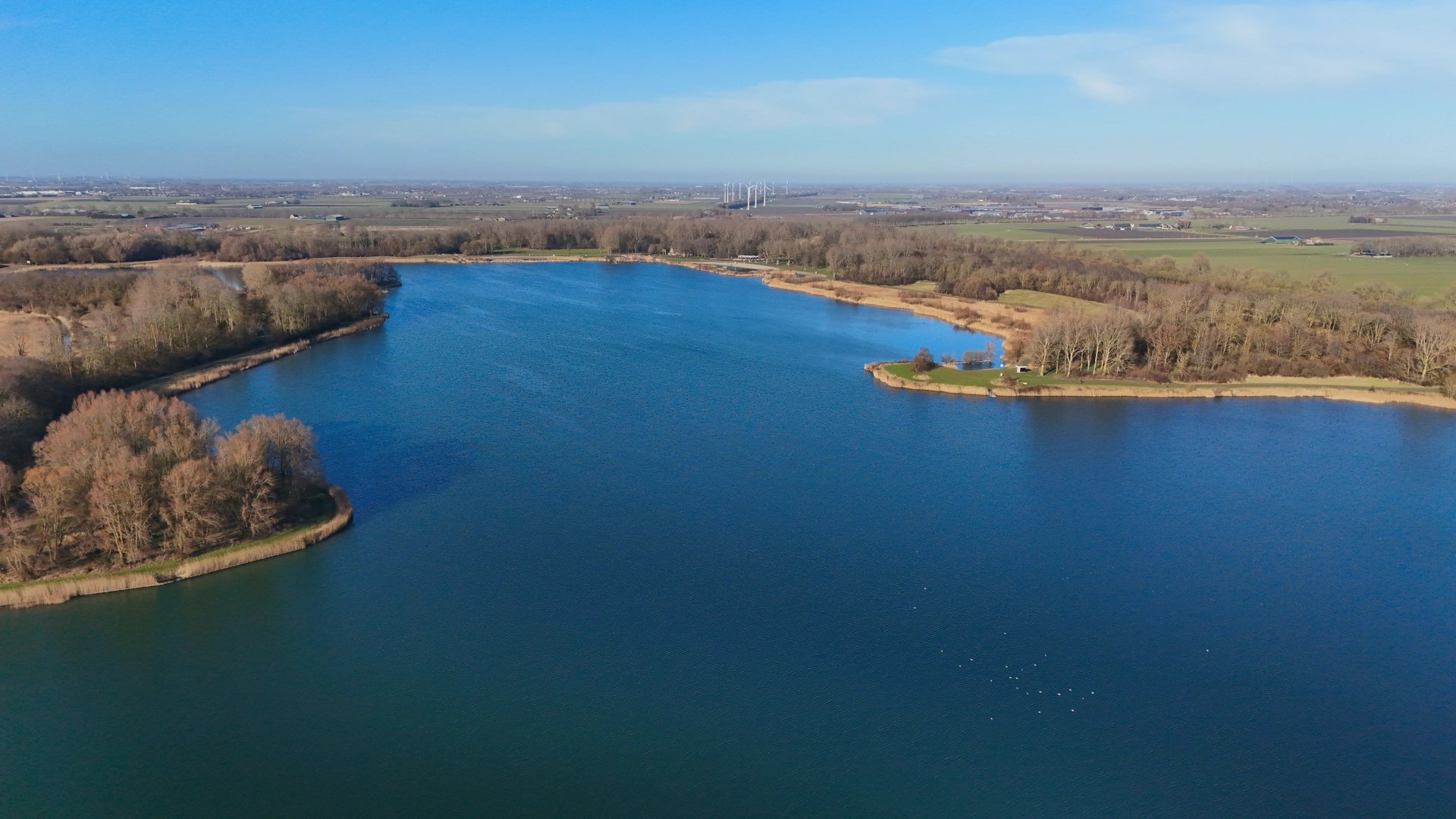 View of the lake "Zomerdel" in Noord-Scharwoude. Its a beautiful sunny day.